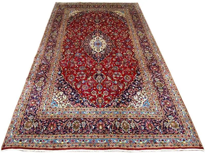 Red Keshan rug with an ornamental medallion and wide border design, 361x250 cm