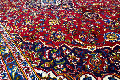 Carpet detail with floral ornaments in red, blue, green, and yellow