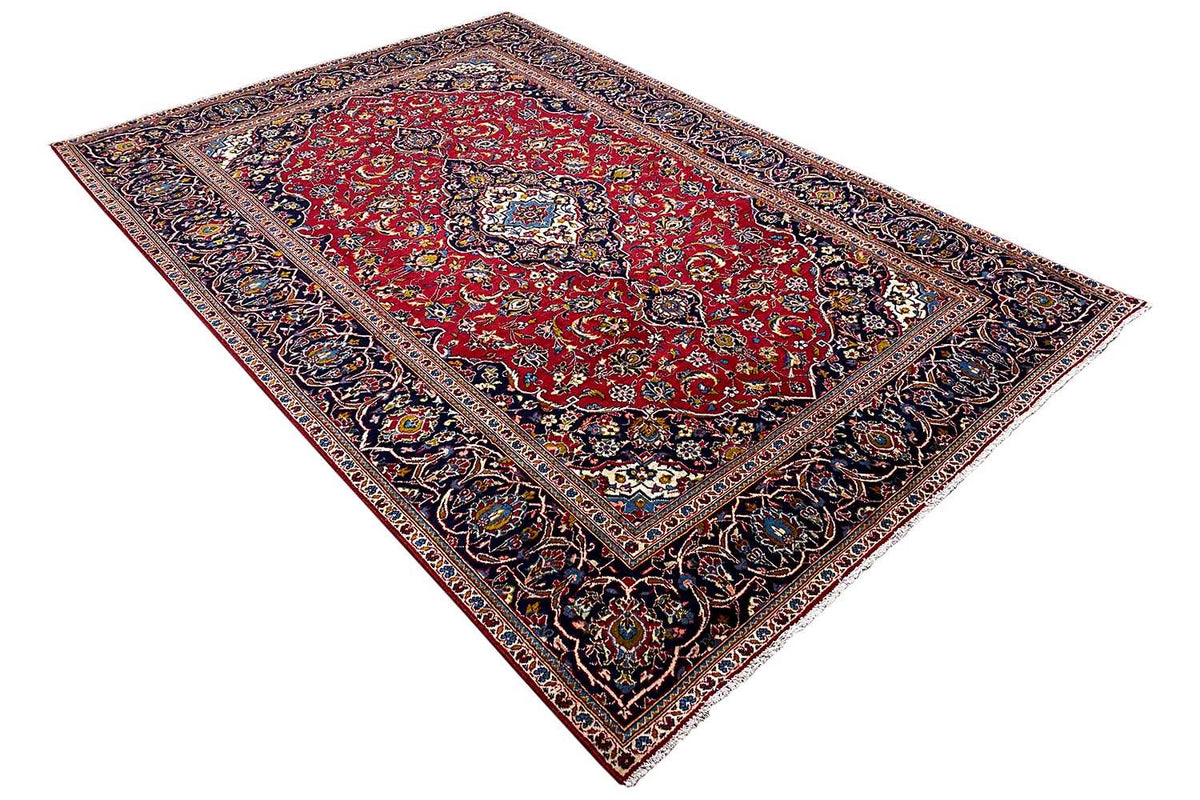 Keshan Oriental rug 286x195 cm, rotated design with a red main field