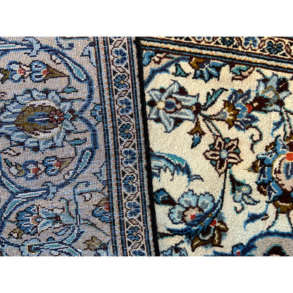 Keshan rug 294x194 cm close-up of the edge: blue ornament alternating with beige