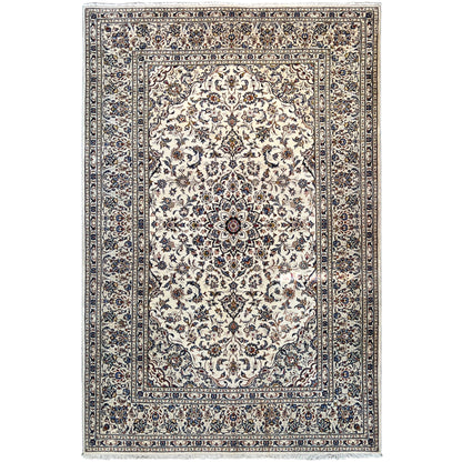 Keshan rug with a light medallion and blue ornamental border pattern