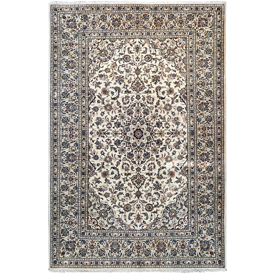 Keshan rug with a light medallion and blue ornamental border pattern