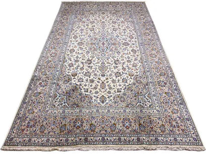 Beige Keshan rug with an ornamental pattern and borders, rectangular