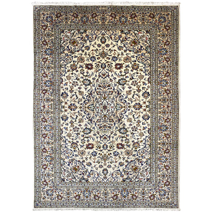 Rectangular Keshan rug: cream-colored base with a multicolored blue ornamental pattern