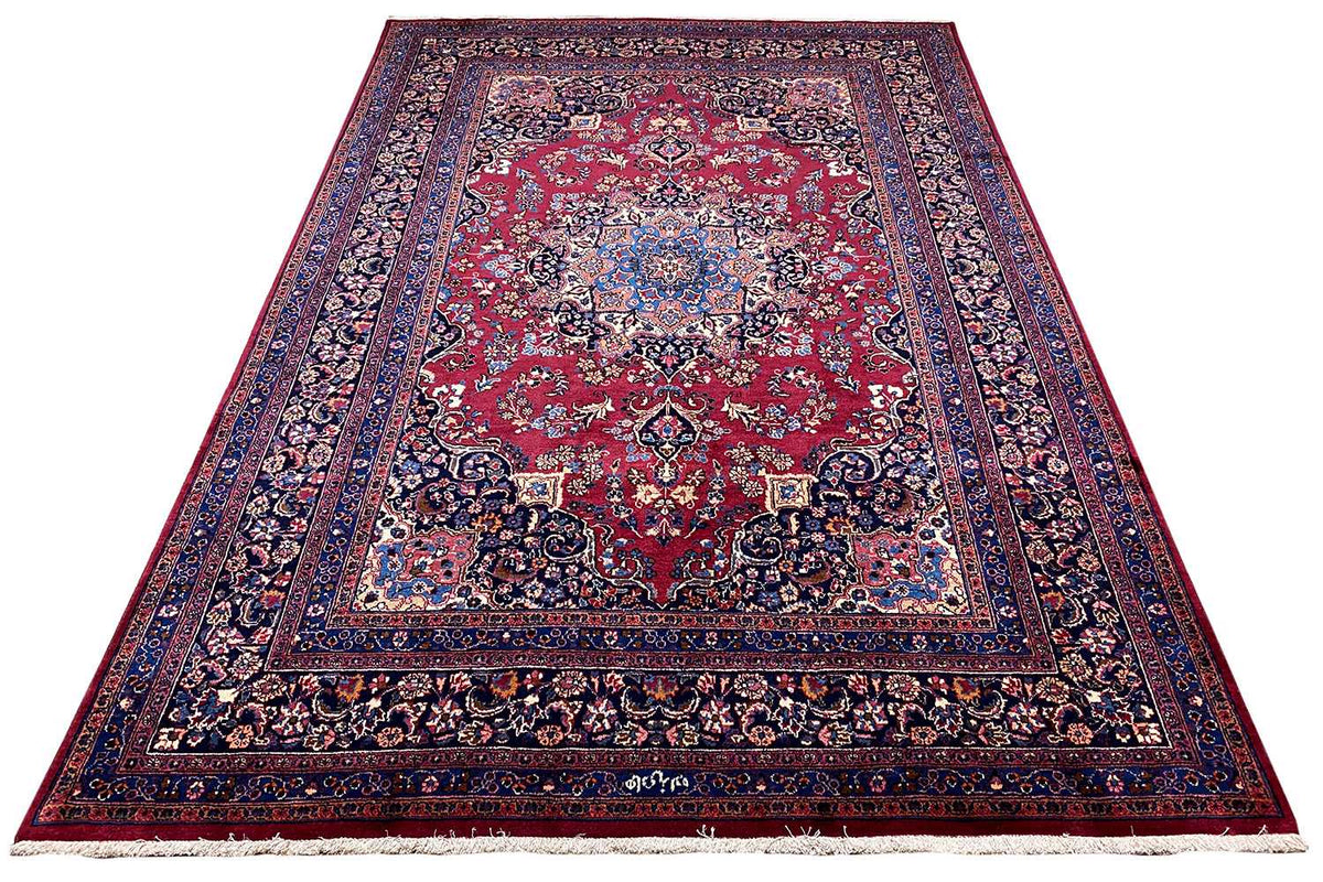 Oriental rug with red medallion and blue border, 296×199 cm