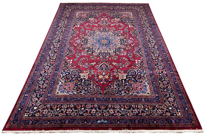 Oriental rug with red medallion and blue border, 296×199 cm