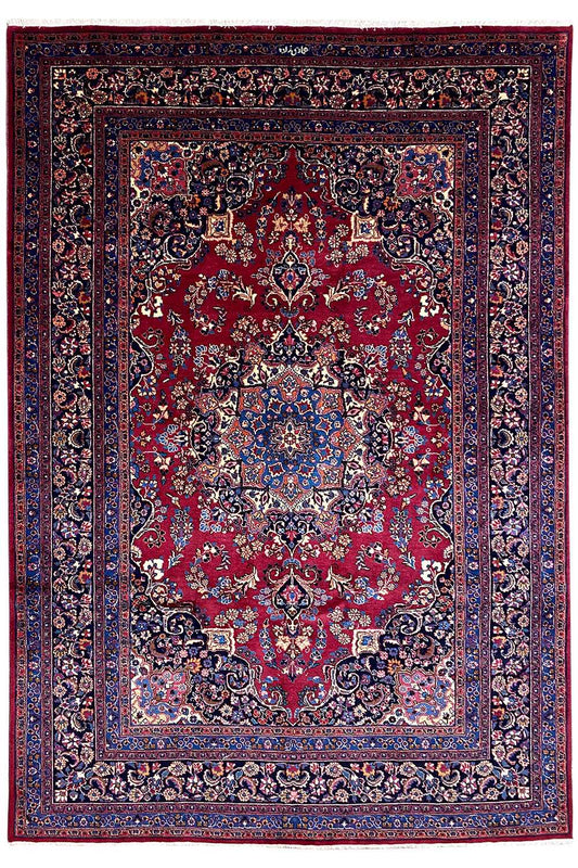 Oriental rug with a red pattern and blue border, 296×199 cm