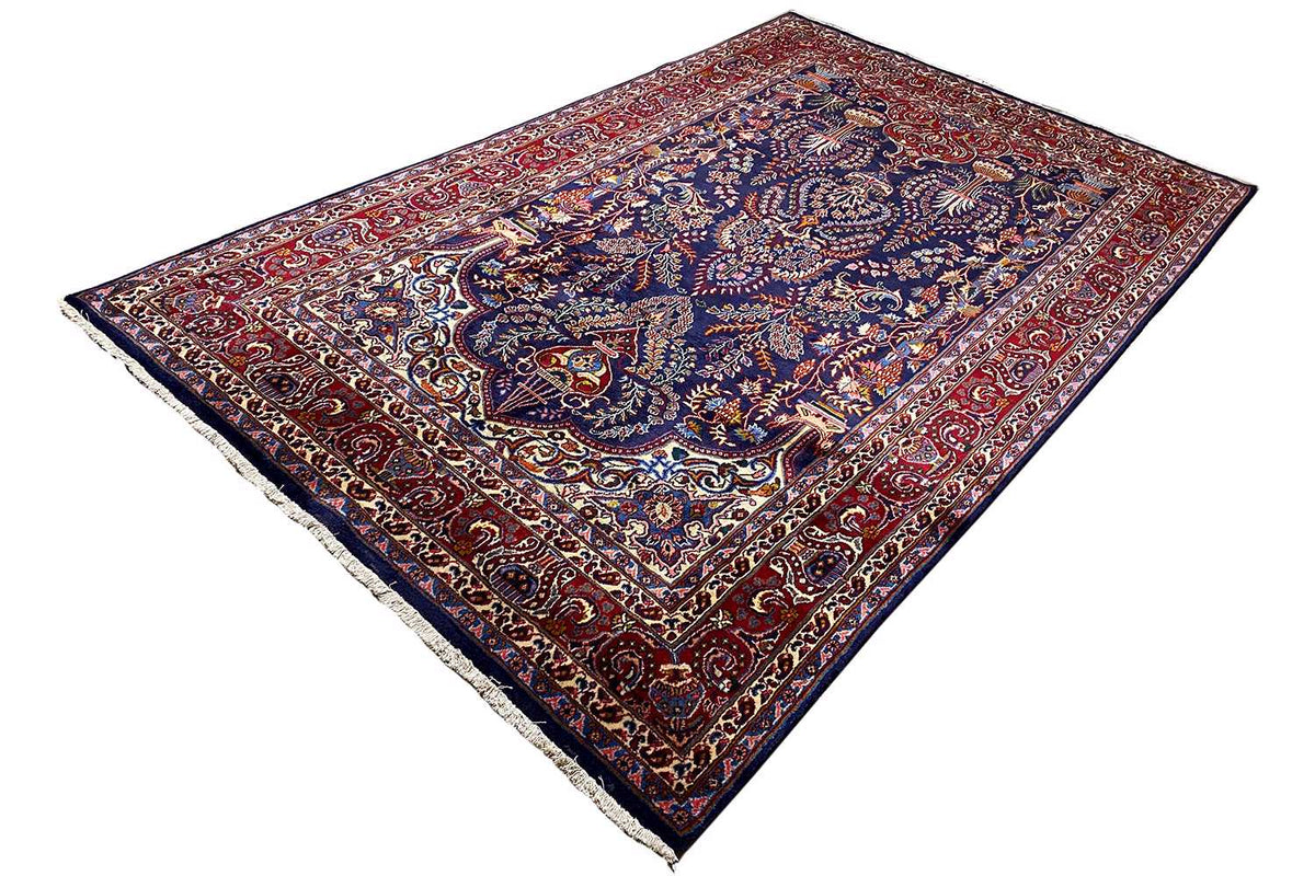 Khorasan oriental rug spread out rectangularly, ornamental medallion, border with fringes
