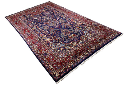 Rectangular Khorasan Oriental rug, diagonal view, richly ornate pattern in red and blue