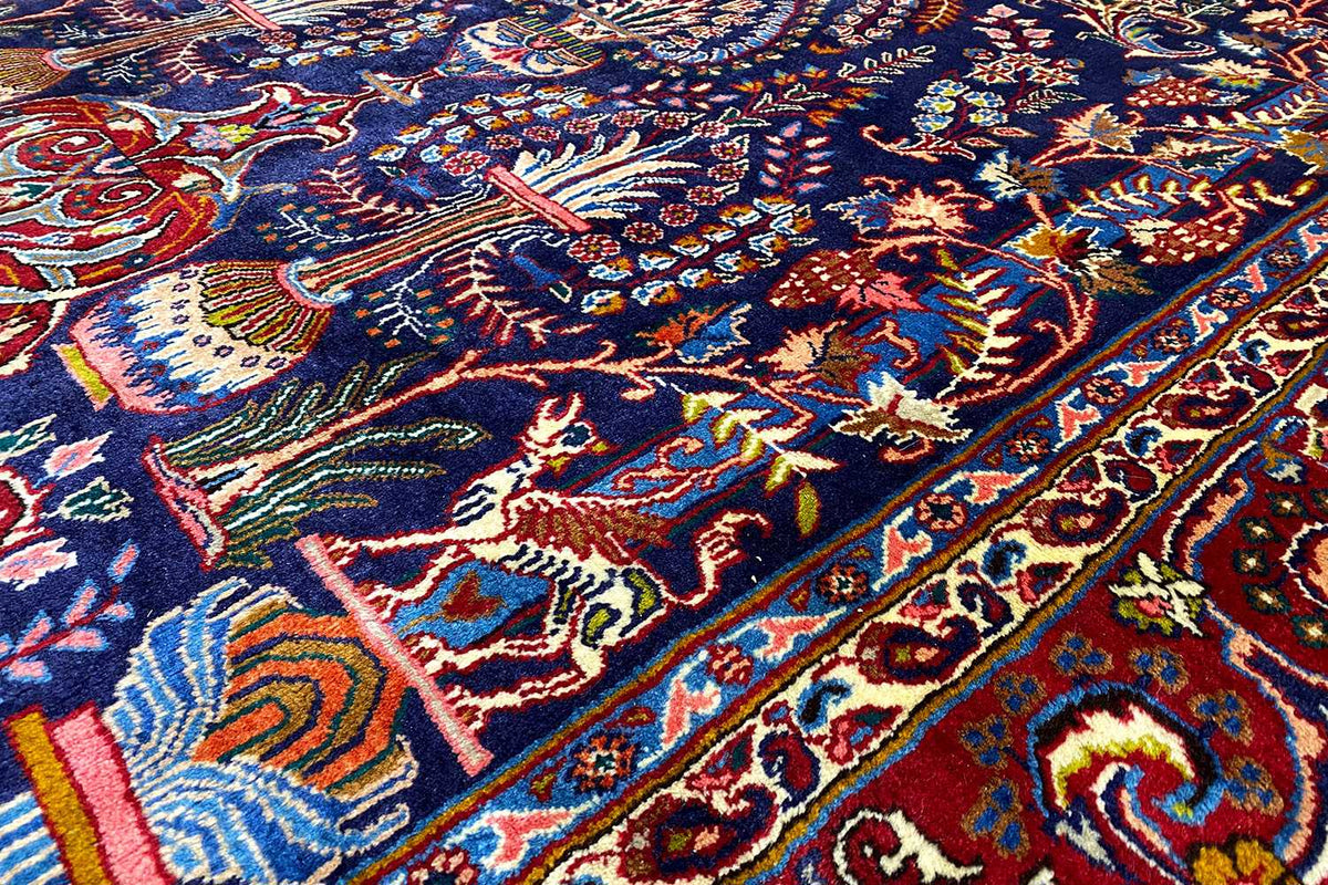 Khorasan Oriental rug close-up: ornamental pattern with tendrils and vase motifs
