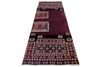 Kelim Bakhtiari rug: triangular overhead view with a framed border, burgundy and dark blue.
