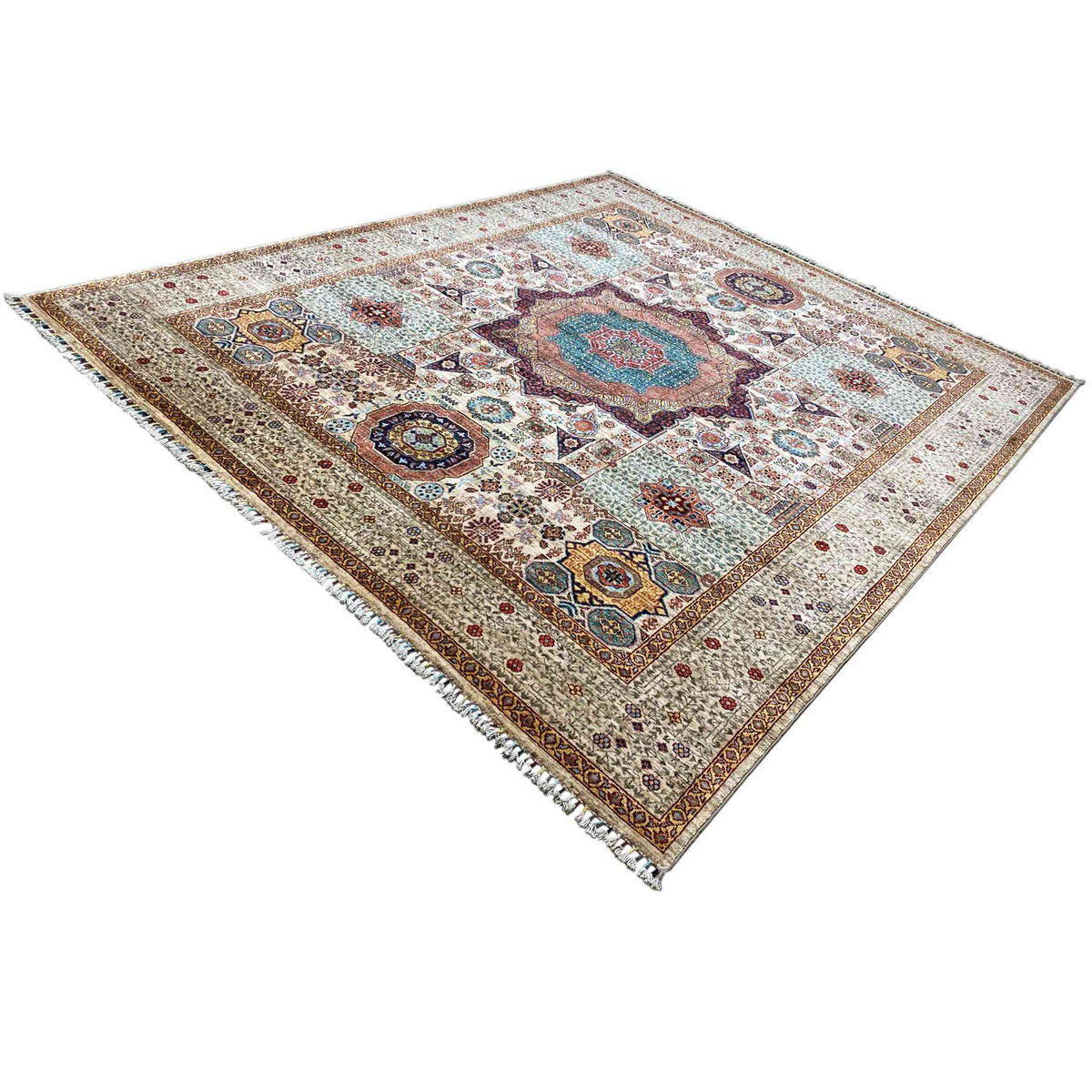 Beige wool rug in a diamond pattern with a central medallion and a variety of ornaments