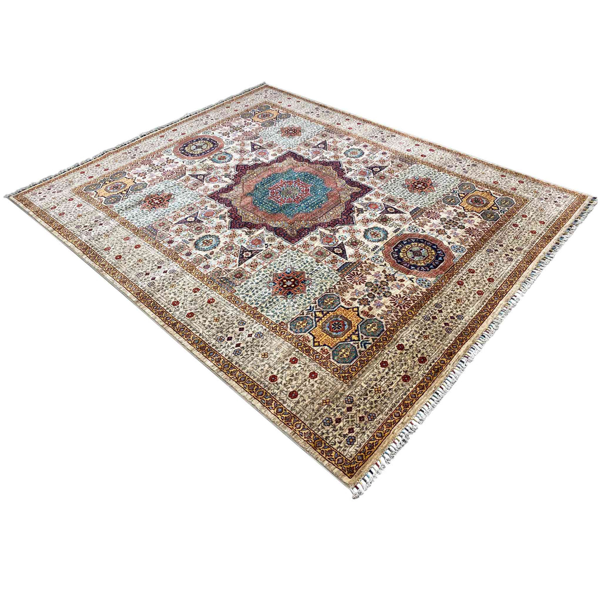 Beige wool rug in diagonal view with a teal medallion and colorful pattern
