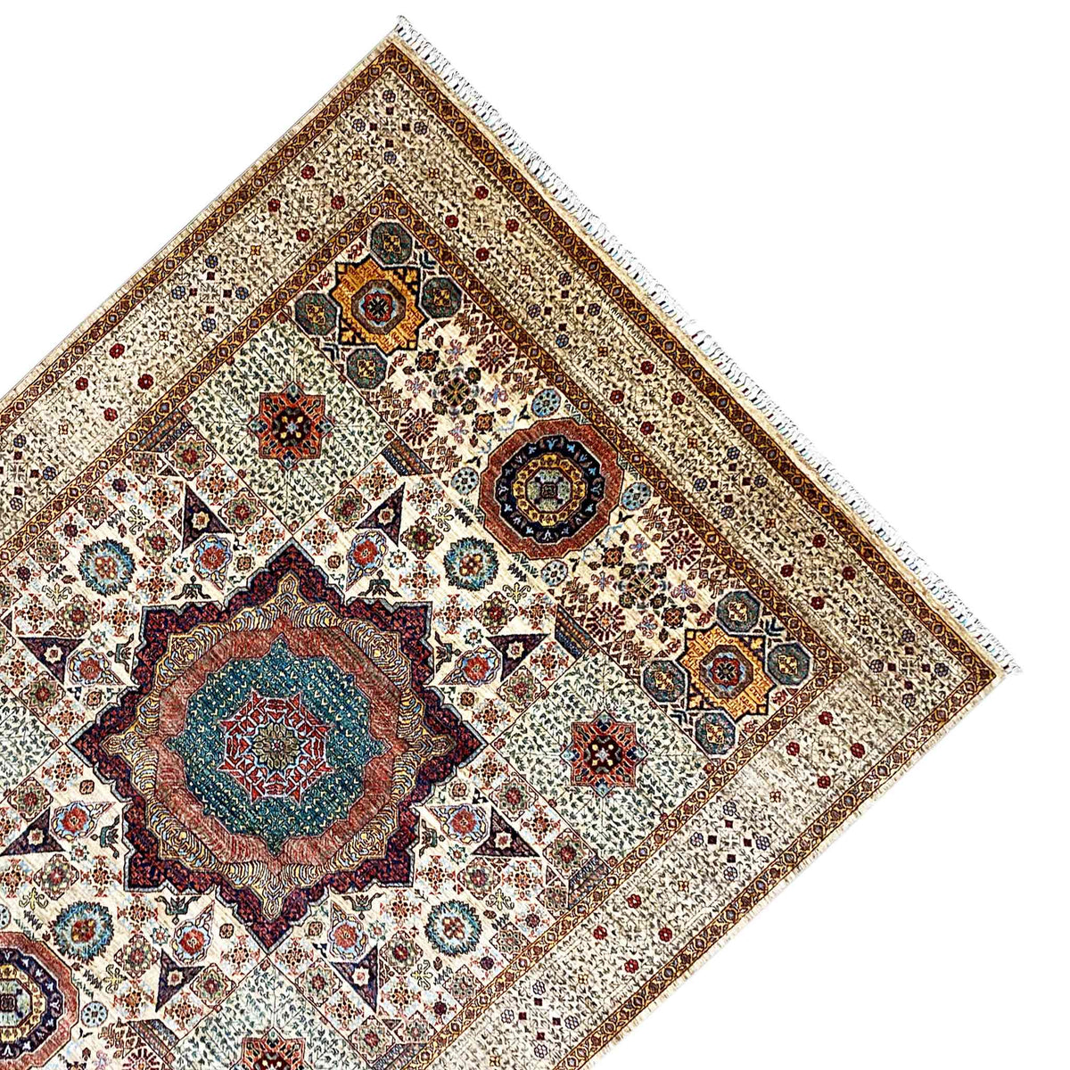 Close-up: Beige wool rug with decorative border, colorful motifs, and fringes