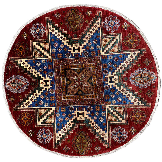 Round wool khorjin rug with a red background and blue-patterned ornamental medallion