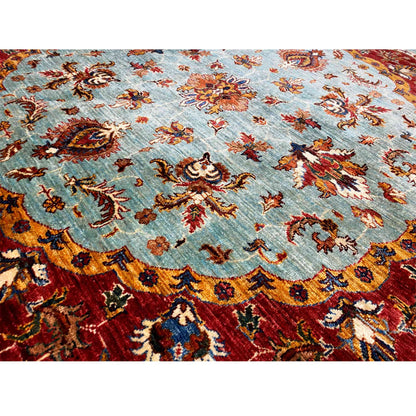 Khorjin rug detail: blue base pattern with colorful floral and vine motifs