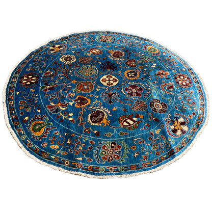 Round wool rug, blue medallion with many floral and animal ornaments
