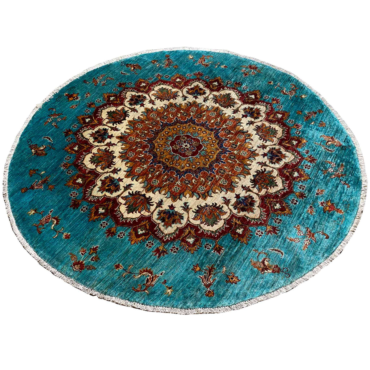 Circular turquoise Khorjin rug with vintage ornaments, a border, and decorative motifs.