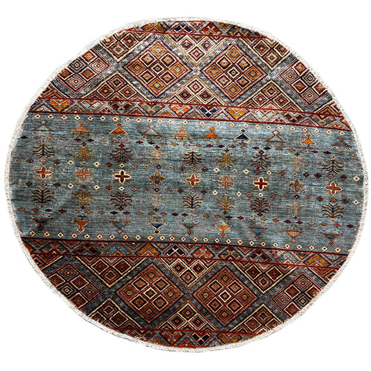 Round hand-knotted wool rug with an ornamental pattern in blue, brown, and beige, approx. 198 cm