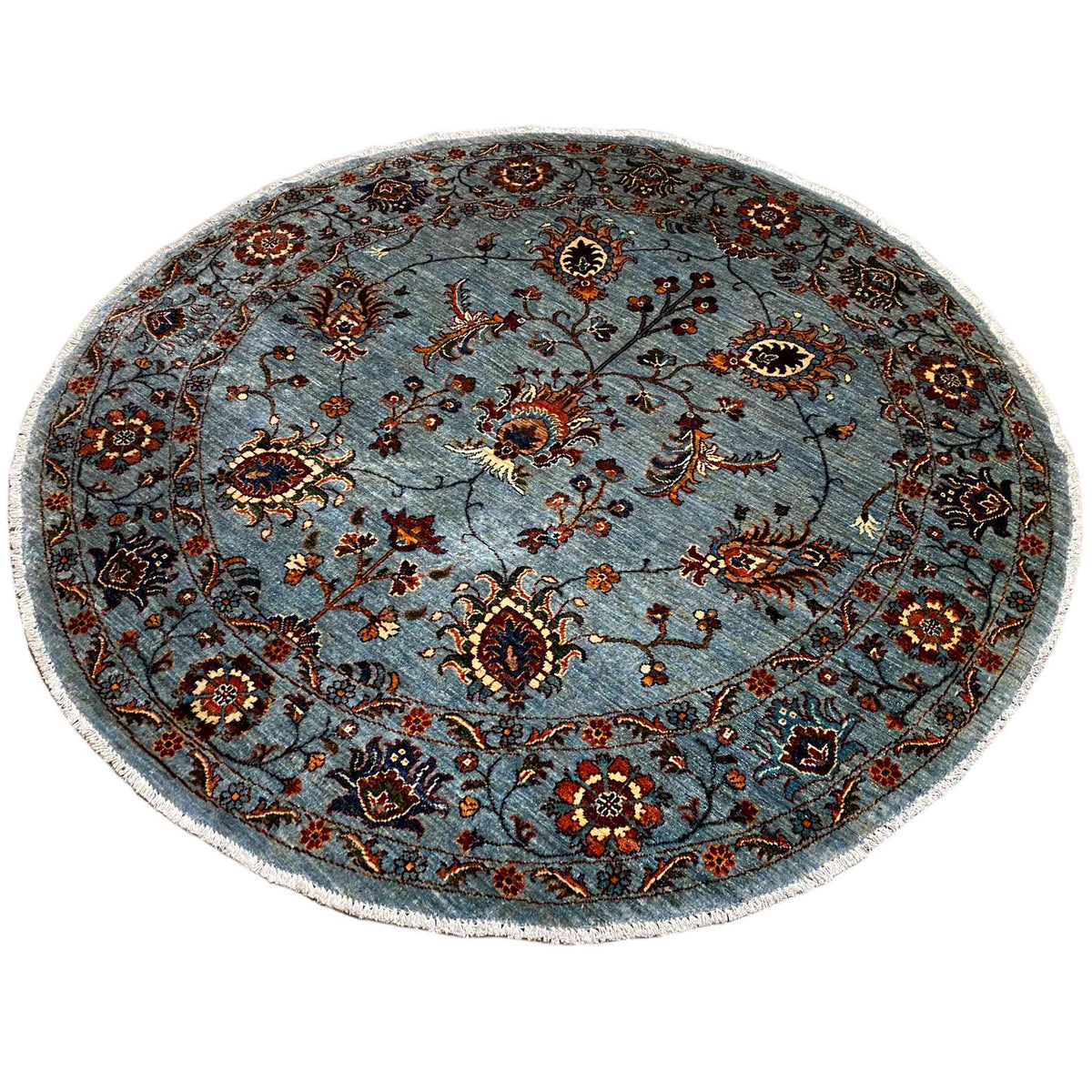 Hand-knotted round Khorjin rug, dense patterns in blue, dark brown, and red