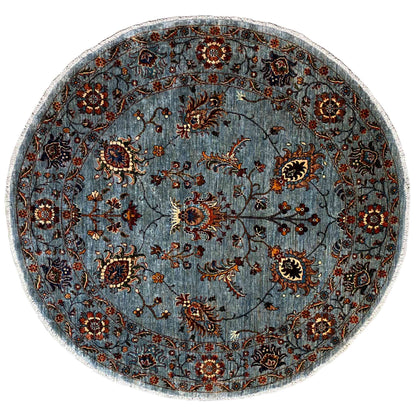 Hand-knotted round Khorjin rug, blue-gray ground with floral pattern details