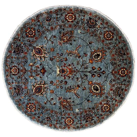Hand-knotted round Khorjin rug, blue-gray ground with floral pattern details