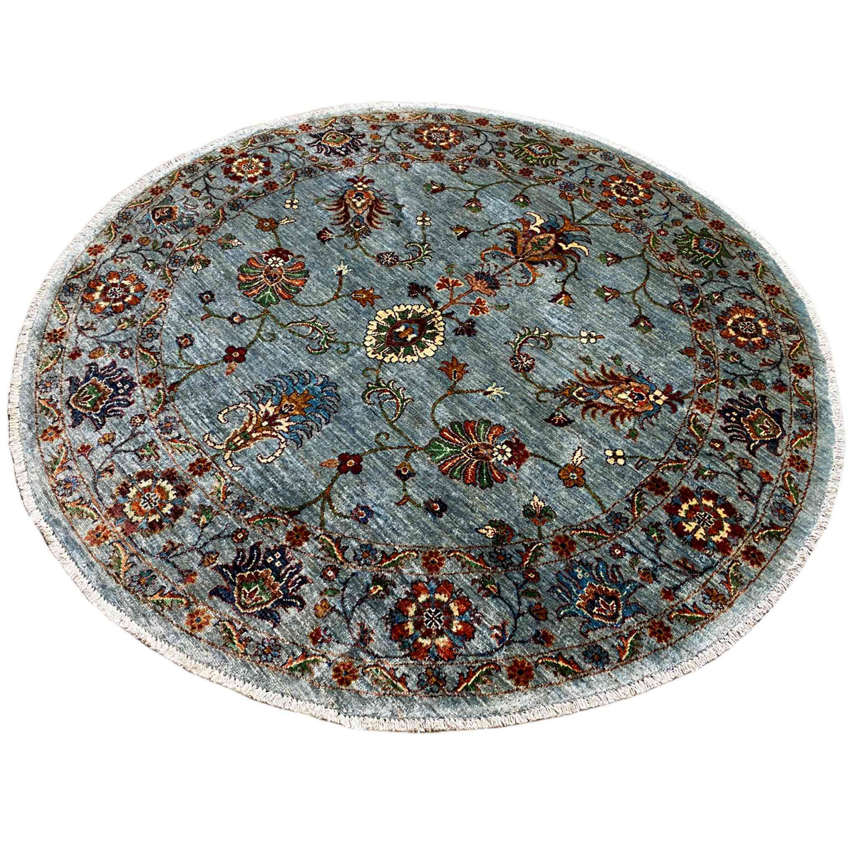 Round Khorjin wool rug in light blue-gray with an intricate animal and floral pattern