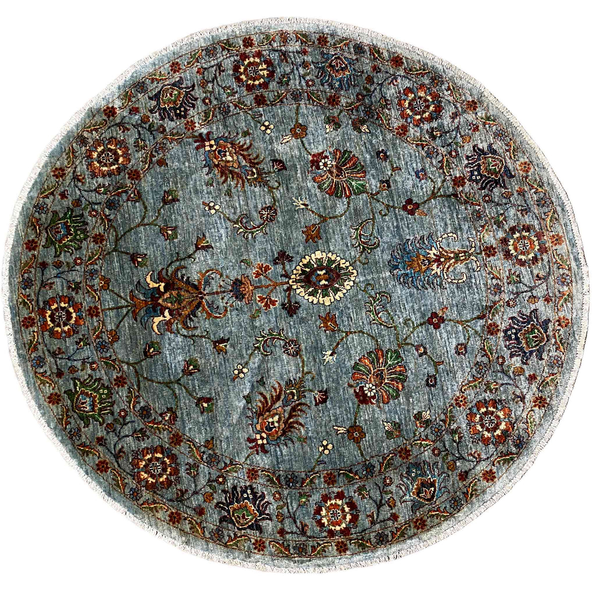 Round Khorjin wool rug in light blue-gray with a colorful floral ornamental pattern