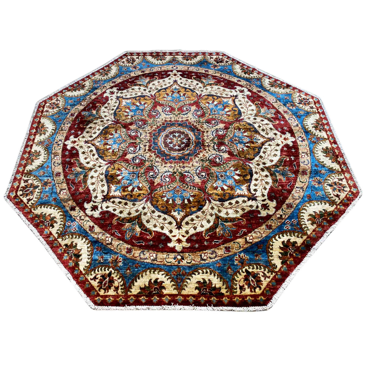 Octagonal rug with a central medallion, floral ornaments, and a wide border pattern