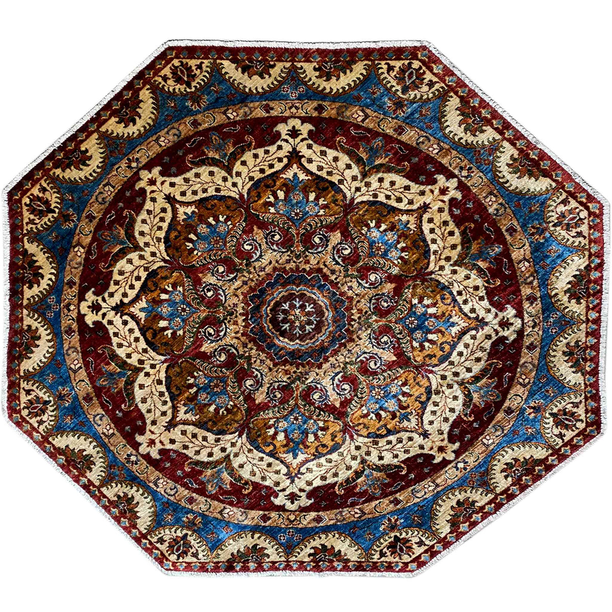 Octagonal rug with an ornamental medallion design in red, blue, and beige