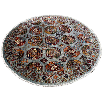Round rug with medallions and decorative border, multicolored on a gray-blue background