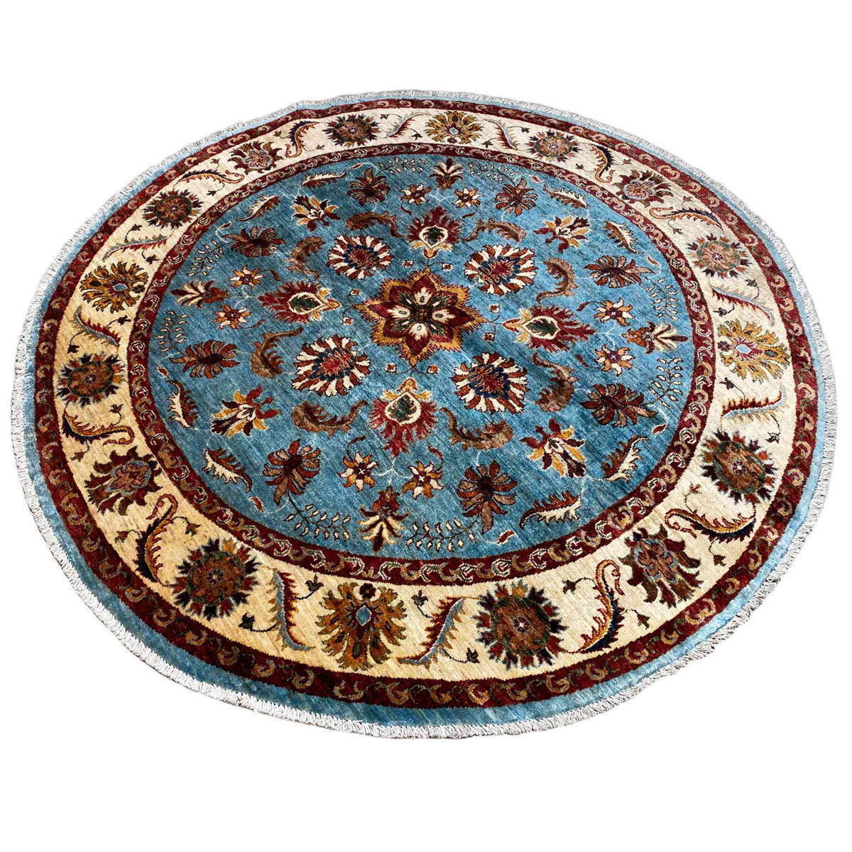 Round blue Khorjin rug with a central ornamental flower and cream-brown border trim