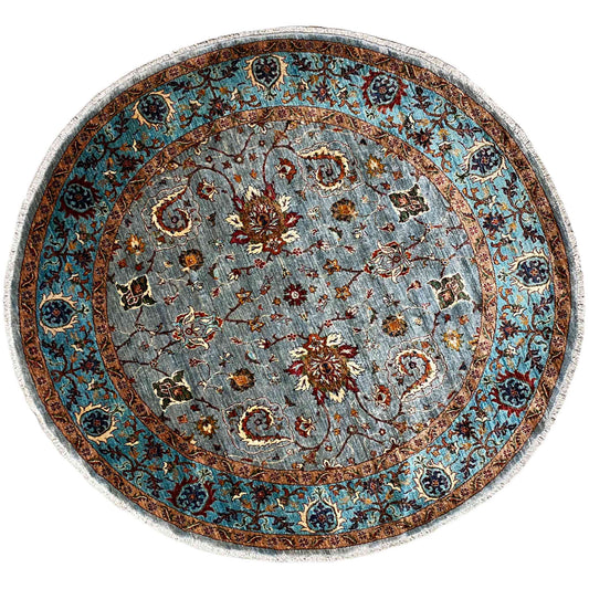 Round wool rug with a blue-gray ornamental pattern and brown border, 207x205 cm