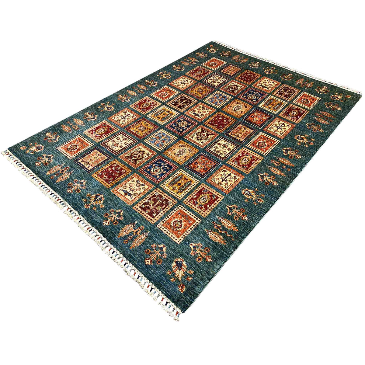 Blue-green rug with square ornaments and decorative borders, multicolored, white fringed edge