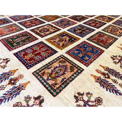 Carpet detail: multicolored squares with floral ornaments on a cream-colored background