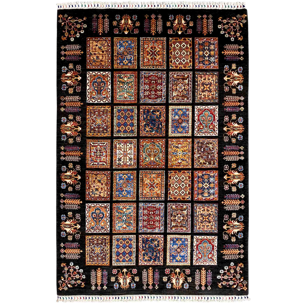 Traditional wool rug with a black background and colorful tile patterns, with a fringed edge