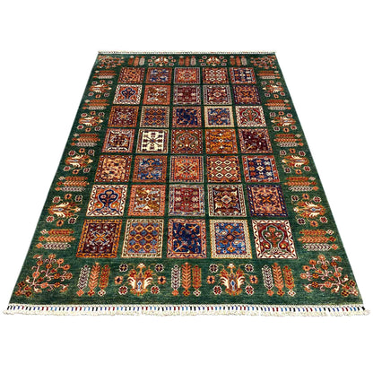 Hand-knotted Khorjin rug, green woven rug with colorful tile motifs