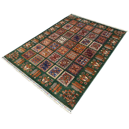 Hand-knotted Khorjin rug, green background with colorful square patterns and fringes