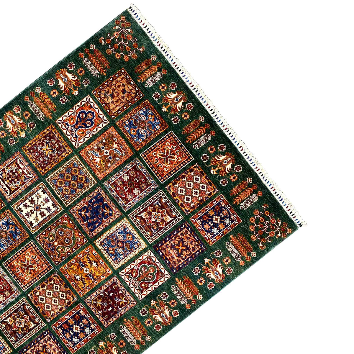 Hand-knotted Khorjin rug corner with fringes, green background and tile ornaments