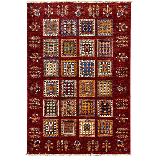 Afghan Khorjin wool rug in a deep red shade with a square pattern, rectangular.