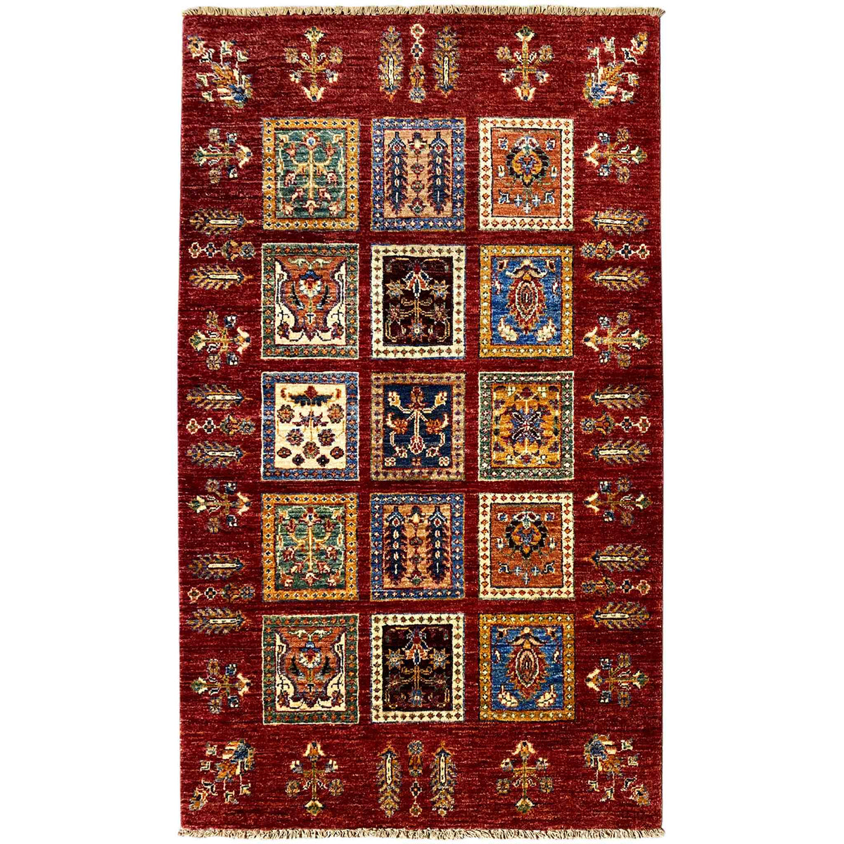 Deep red wool rug with Khorjin medallions and a geometric border with an all-over pattern