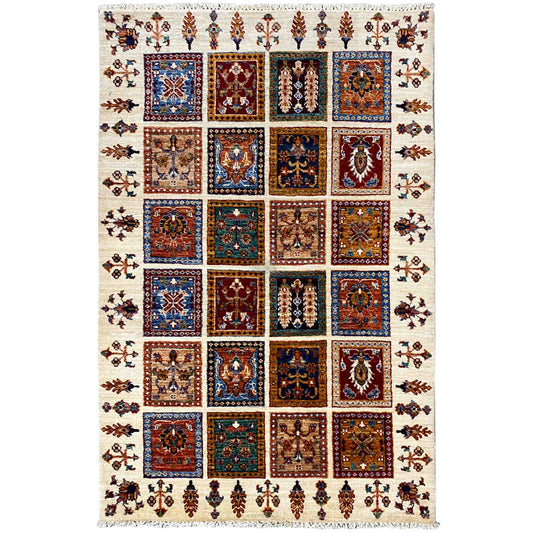 Wool rug, ivory with a multicolored tile pattern and ornamental border