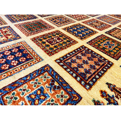 Detailed view of Afghan Khorjin rug: colorful tile motifs in a geometric diamond pattern