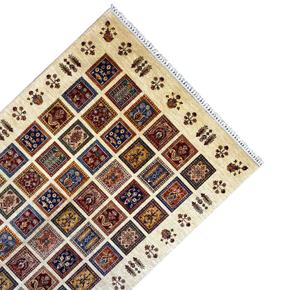 Beige rug with diagonal diamonds, colorful floral ornaments, and decorative fringes