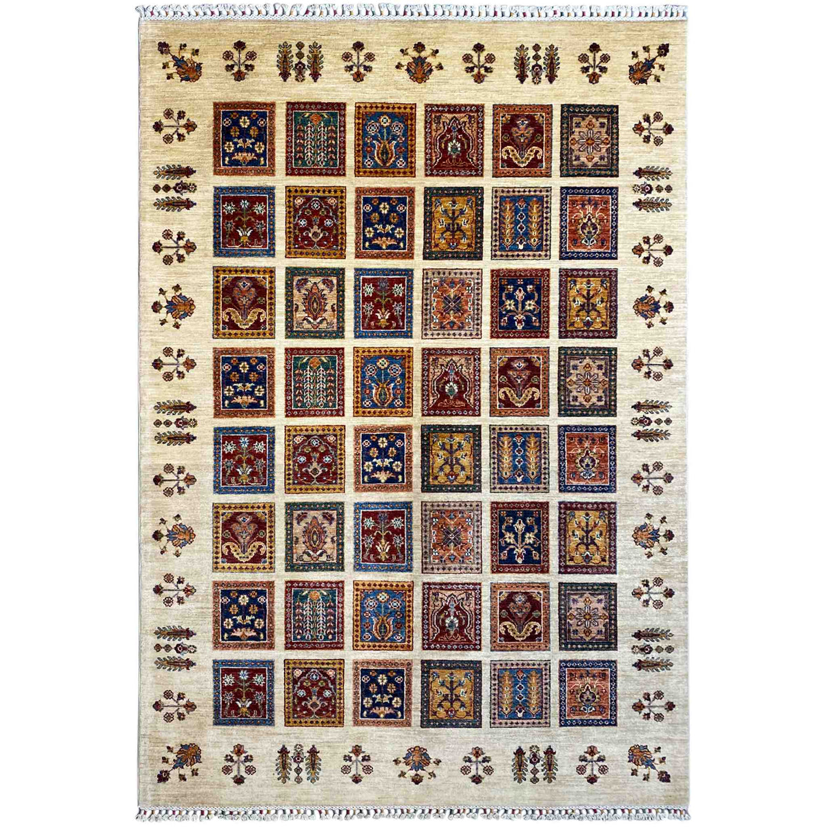 Beige Khorjin rug with a square tile pattern and colorful ornaments