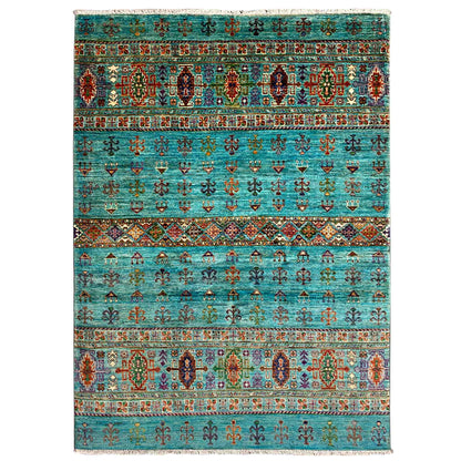 Petrol blue rug with decorative border and patterned motifs, rectangular