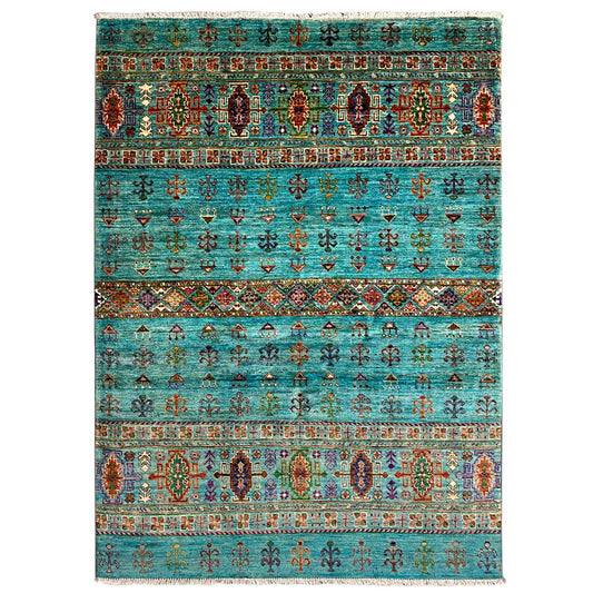 Petrol blue rug with decorative border and patterned motifs, rectangular