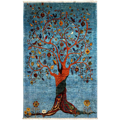 Blue Afghan Khorjin rug with a tree and figure design, floral vines, and fringes
