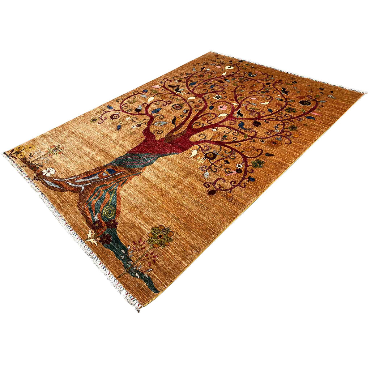 Afghan khorjin rug, angled view: tree crown with colorful ornaments, fringed edge