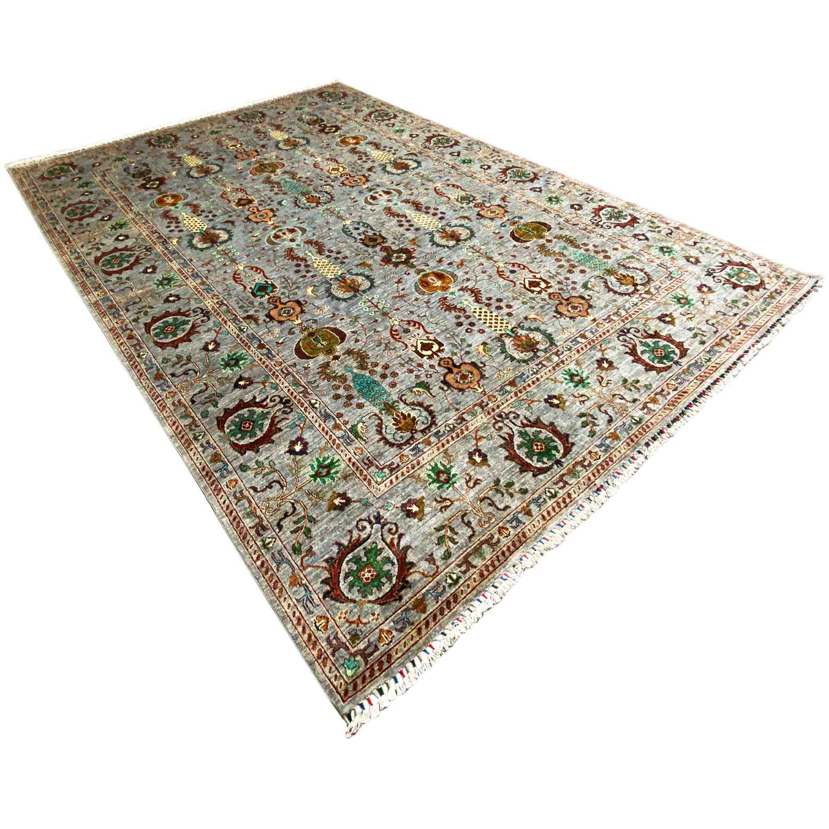 Corner view: gray carpet with delicate ornaments and border line